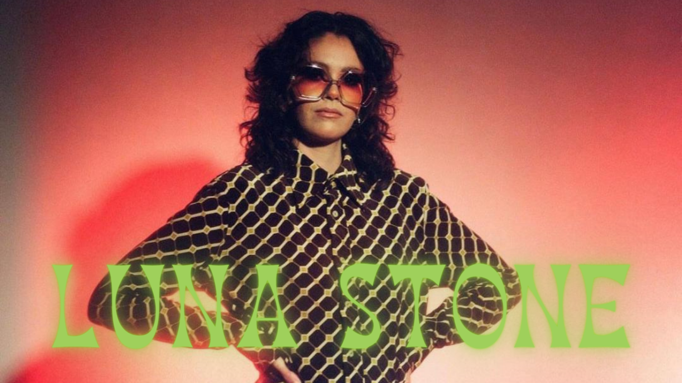 pink background featuring woman wearing 1970s blouse and 70s style sunglasses and neon green Luna Stone logo