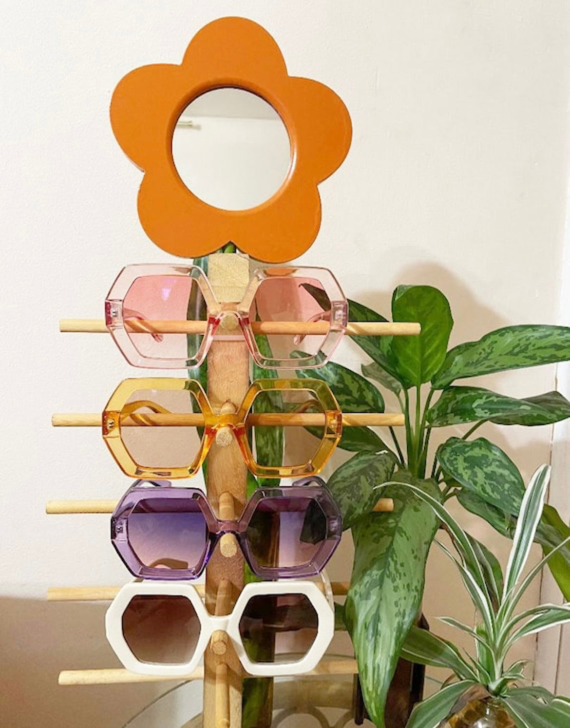 flower stand with all colors with plants in the background The ELTON 1970s Vintage Style Oversized Hexagon Square Sunglasses