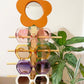 flower stand with all colors with plants in the background The ELTON 1970s Vintage Style Oversized Hexagon Square Sunglasses